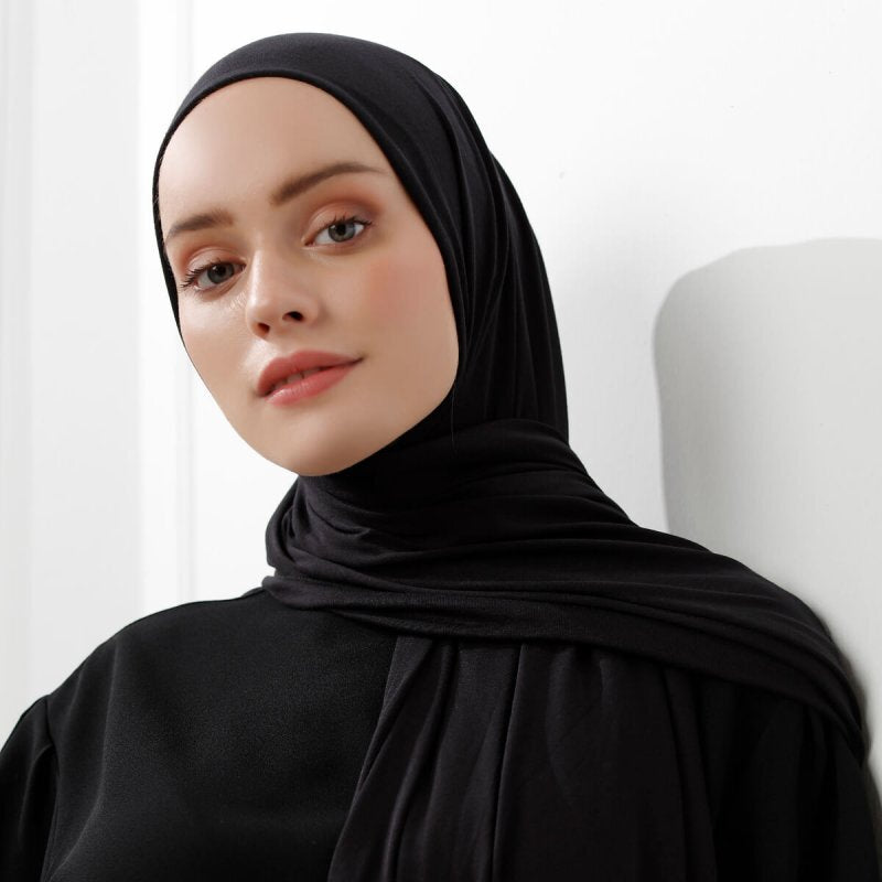 Shop ZERA® Premium Bamboo Jersey Hijab – Triple Black at ANAYAH HIJABS. Soft, breathable, stretchable hijab with fast online delivery across India.
